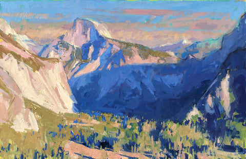 Creeping shadow across valley Half Dome